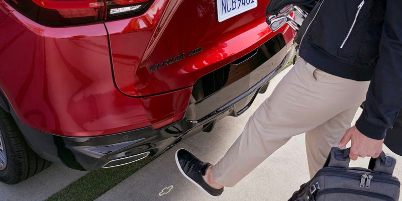Chevrolet Blazer car sunroof from inside with girl and boy at front seat