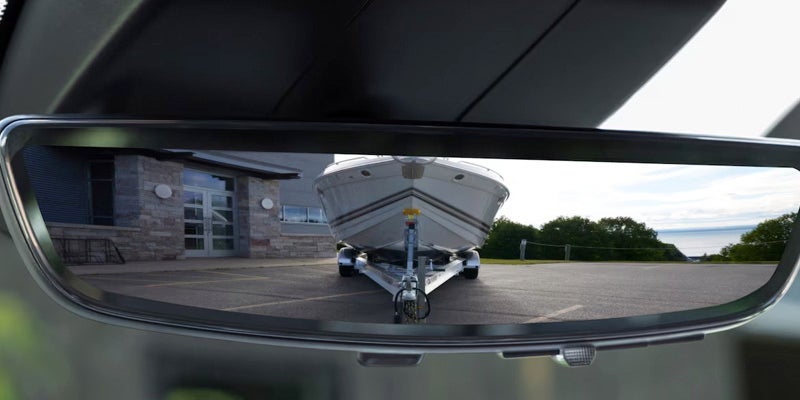 2025 Chevrolet Silverado 2500 HD Rearview mirror display showing a boat.
