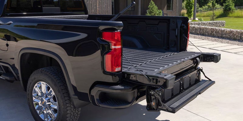 2025 Chevrolet Silverado 2500 HD black with tailgate open